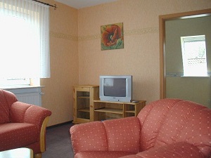 Ferienwohnung Ole School Wohnzimmer Bild 2